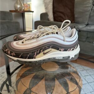 Nike Women's Air Max 97 Premium Ridgerock Mink Brown, Camo green, and white.